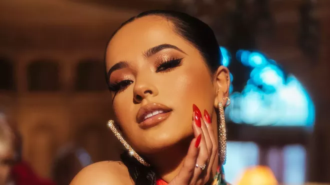 A glamour shot of a young Latino woman.