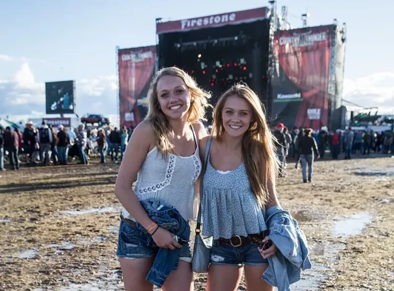 Image: A pair of Country Thunder attendees in 2016.
