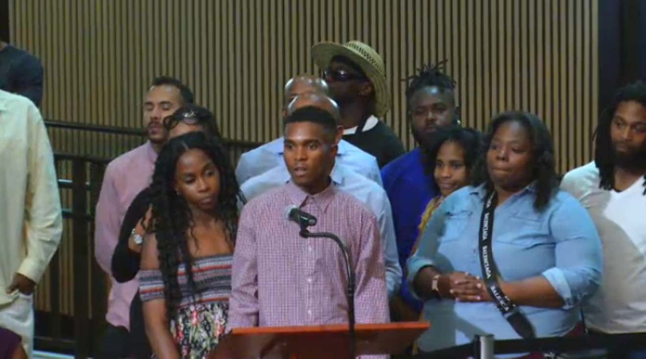 Dravon Ames, family, and supporters address the Phoenix City Council on June 19, 2019.
