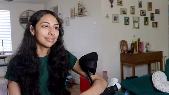 A young woman in her home