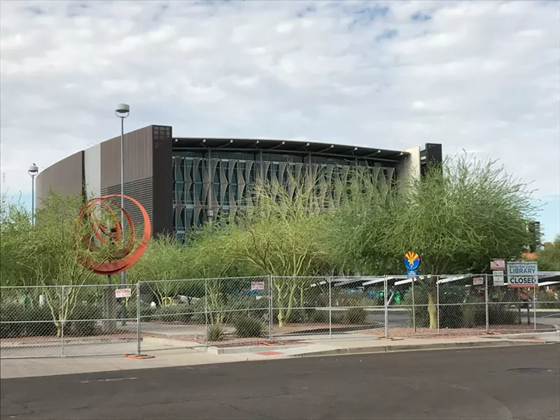 Image: Burton Barr Central Library, with fencing around its perimeter, on July 22, 2017.