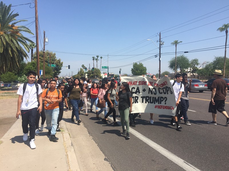 Roughly 300 students from South Mountain High School left class to protest the repeal of DACA.