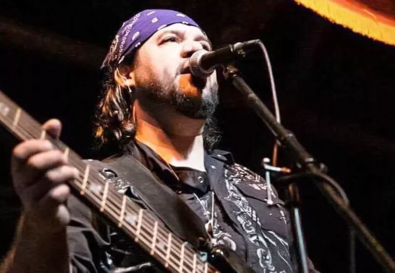 Image: Local musician Ethan Newman during one of his many gigs around the Valley.