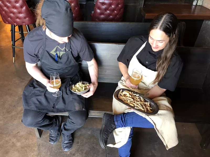 Image: Tamara Stanger and Cotton & Copper sous chef Nolan Barth with freshly collected mesquite pods.