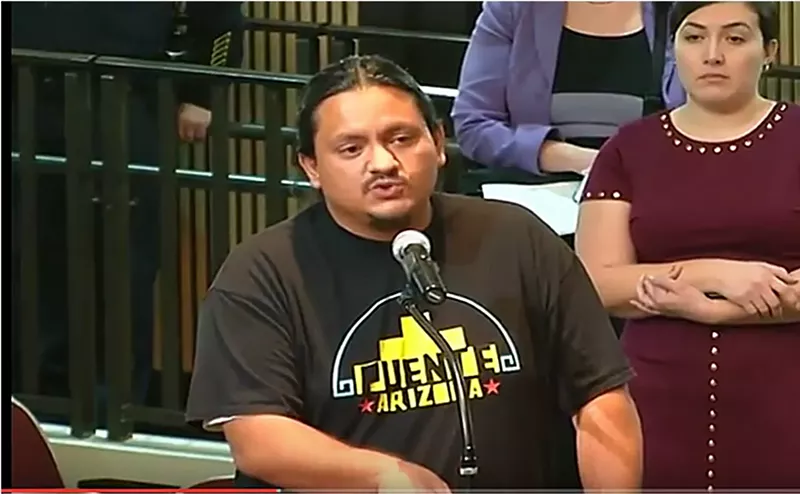 Image: Carlos Garcia speaks during a City Council meeting.