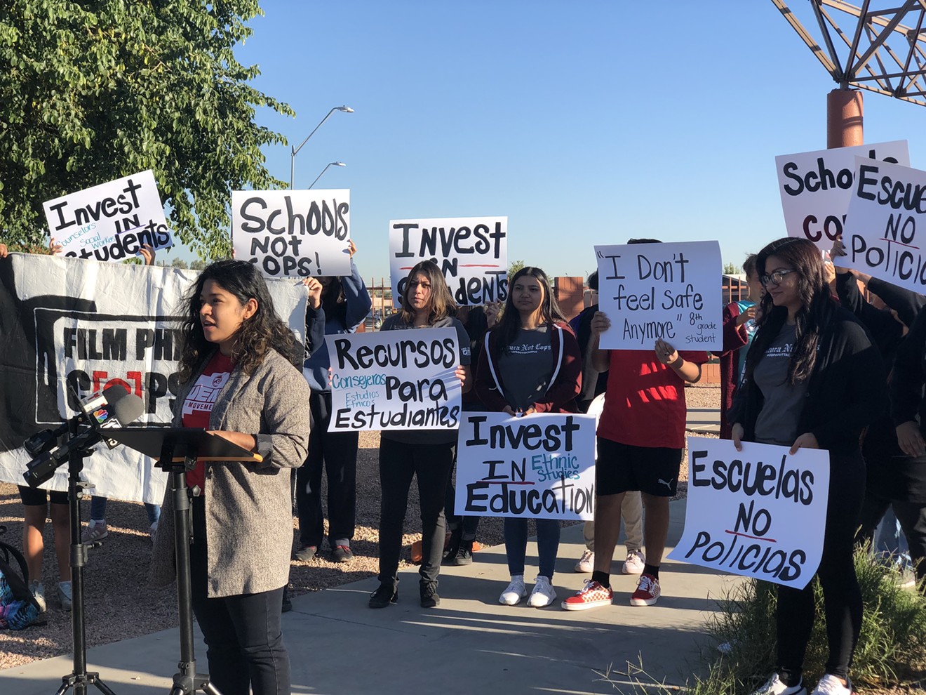 Maxima Guerrero, 29, youth campaign organizer at Puente Human Rights Movement, speaking at a press conference outside Isaac Middle School on Tuesday, October 29.