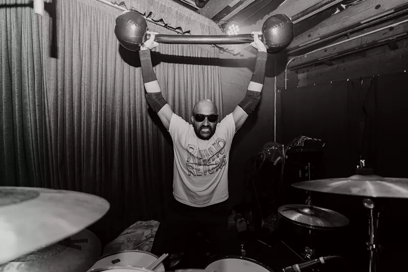 Image: Chrome Rhino Jay Ryan shows off his strength at the Rock 'N' Roll Rumble.