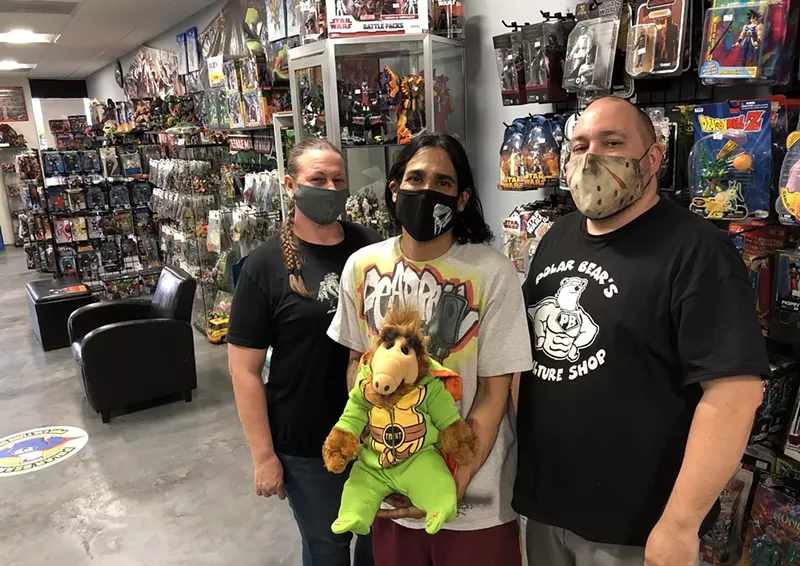 Image: Tianne Pitz (left), James Hiralez (center), and Jason Mansfield of Polar Bear's Pop Culture Shop in Tempe.