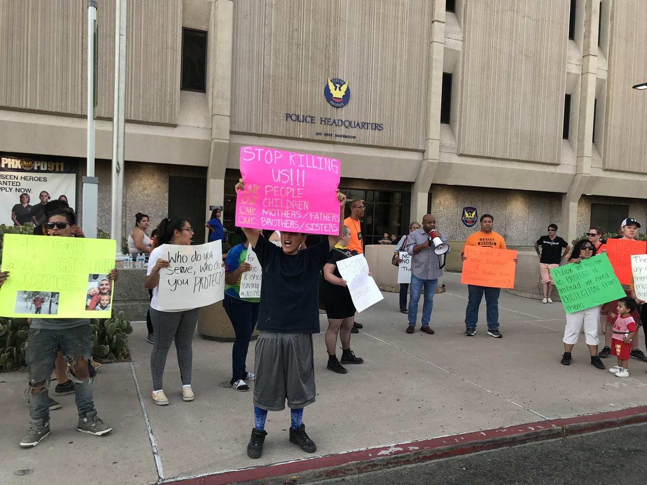 Protesters outside Phoenix police headquarters.