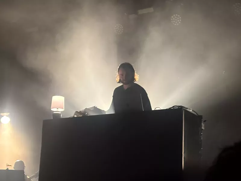 Image: Dance music DJ performs.