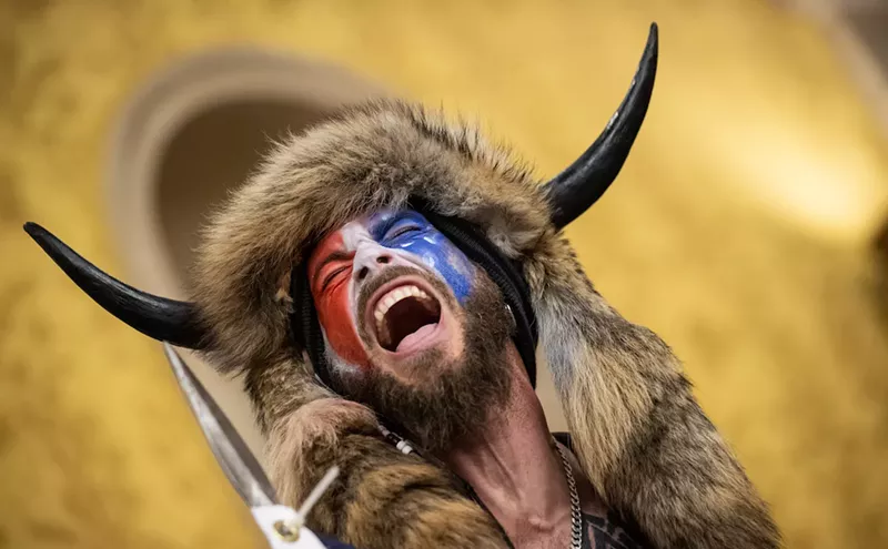 Image: QAnon Shaman calls Trump ‘a piece of shit,’ demands $555 to talk to us