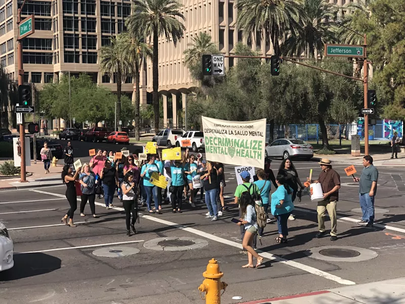 Image: Friends, family, and community members protest the Maricopa County Attorney's Office's decision to charge two teenage inmates with past histories of trauma, Breanna Gonzales, 17, and Valentina Gloria, 19, with severe crimes.