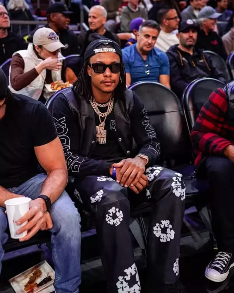 Image: Man at basketball game.