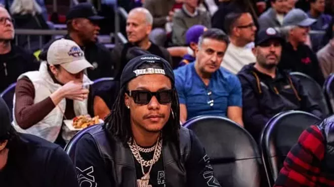 Man at basketball game.