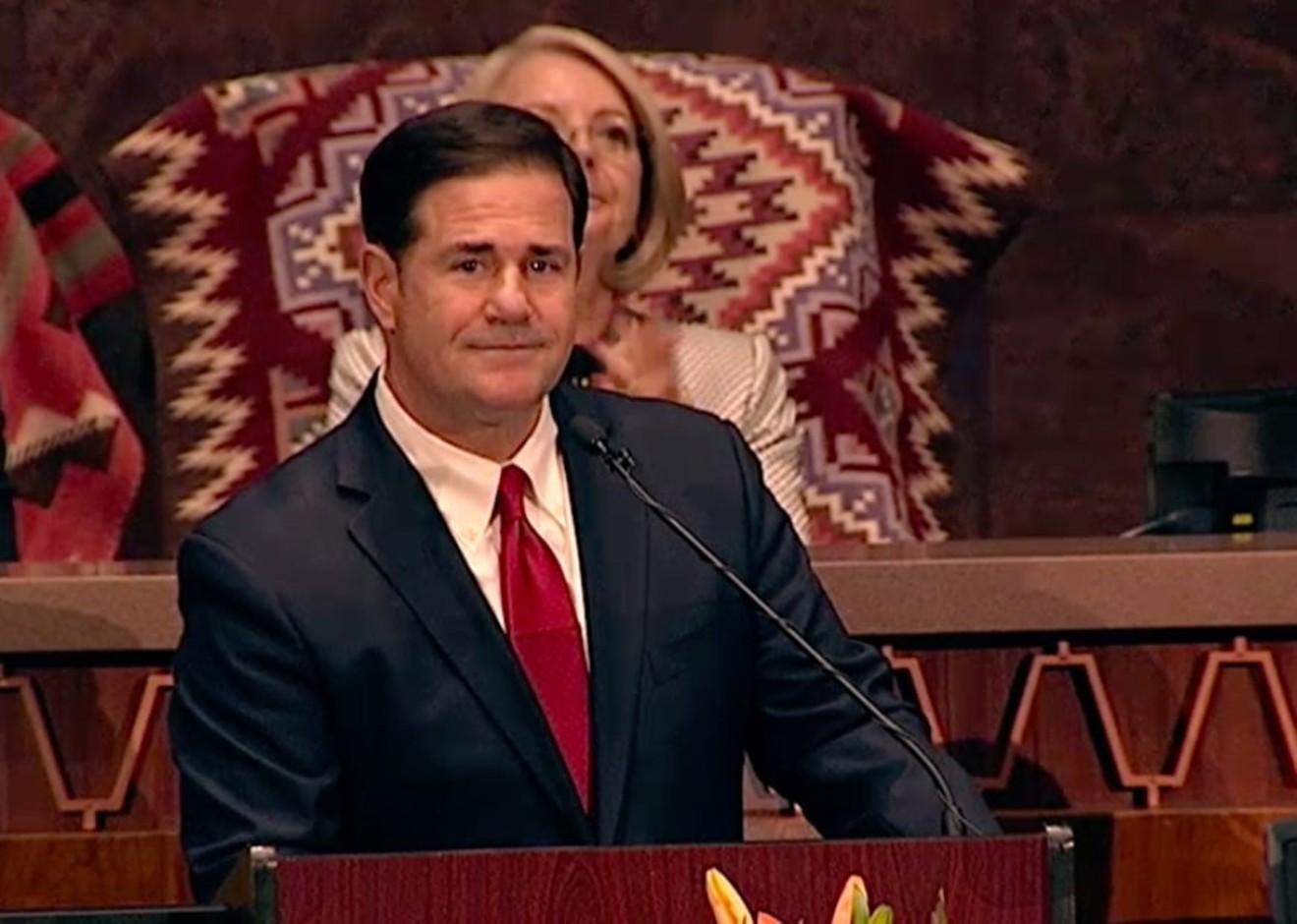 Governor Doug Ducey stands in front of Arizona lawmakers for his 2020 "State of the State" address.