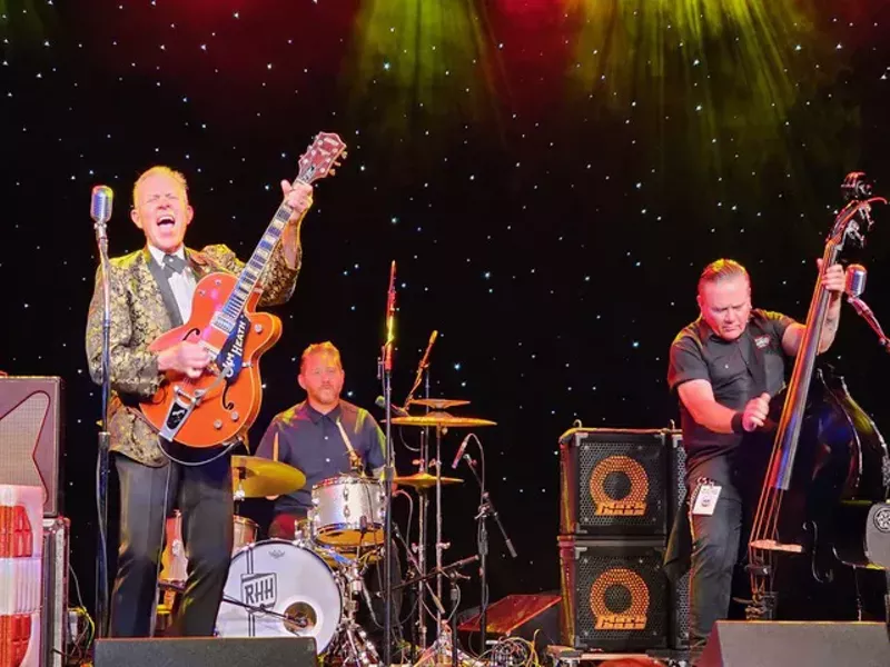 Image: Reverend Horton Heat pose during an undated show.