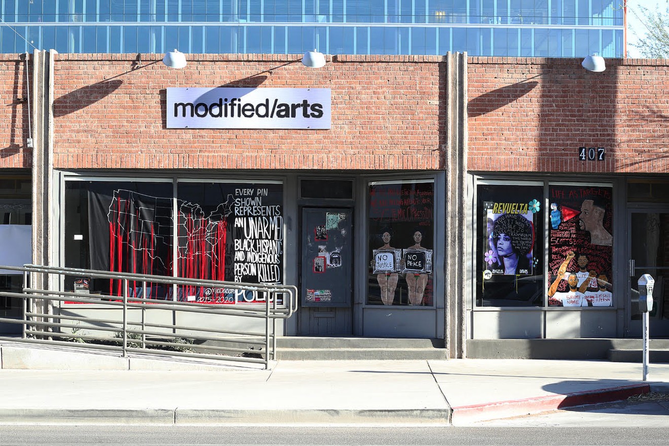 Three artists have work installed in Modified Arts windows.