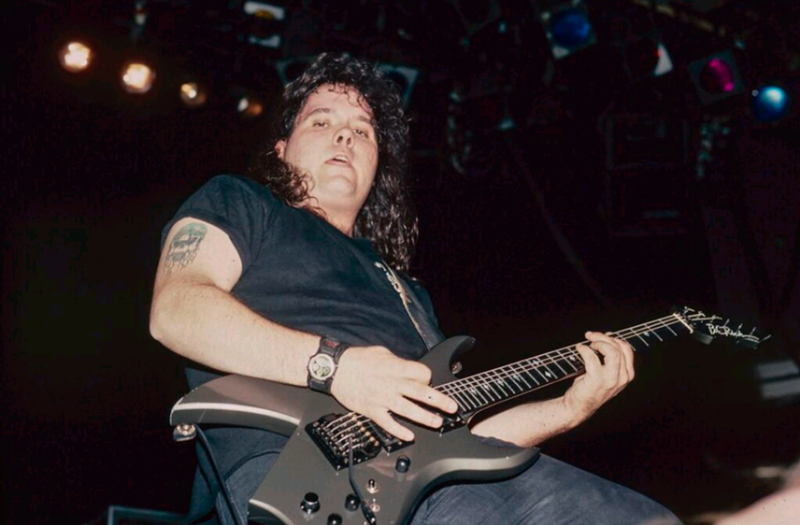 Image: Founding member of Sacred Reich Jason Rainey onstage in the early days of the band with one of his favorite guitars.