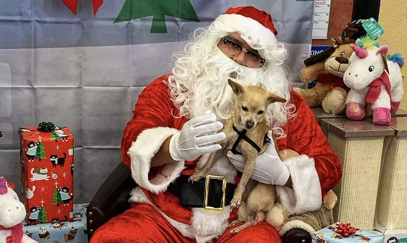 Image: Santa’s lapdog: Mr. Claus and pal do Christmas at Petsmart.