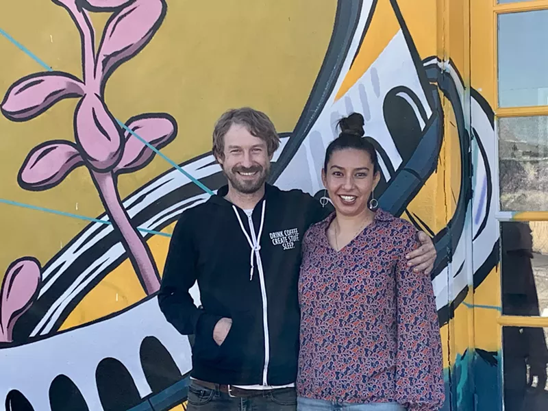 Image: two people pose for a picture