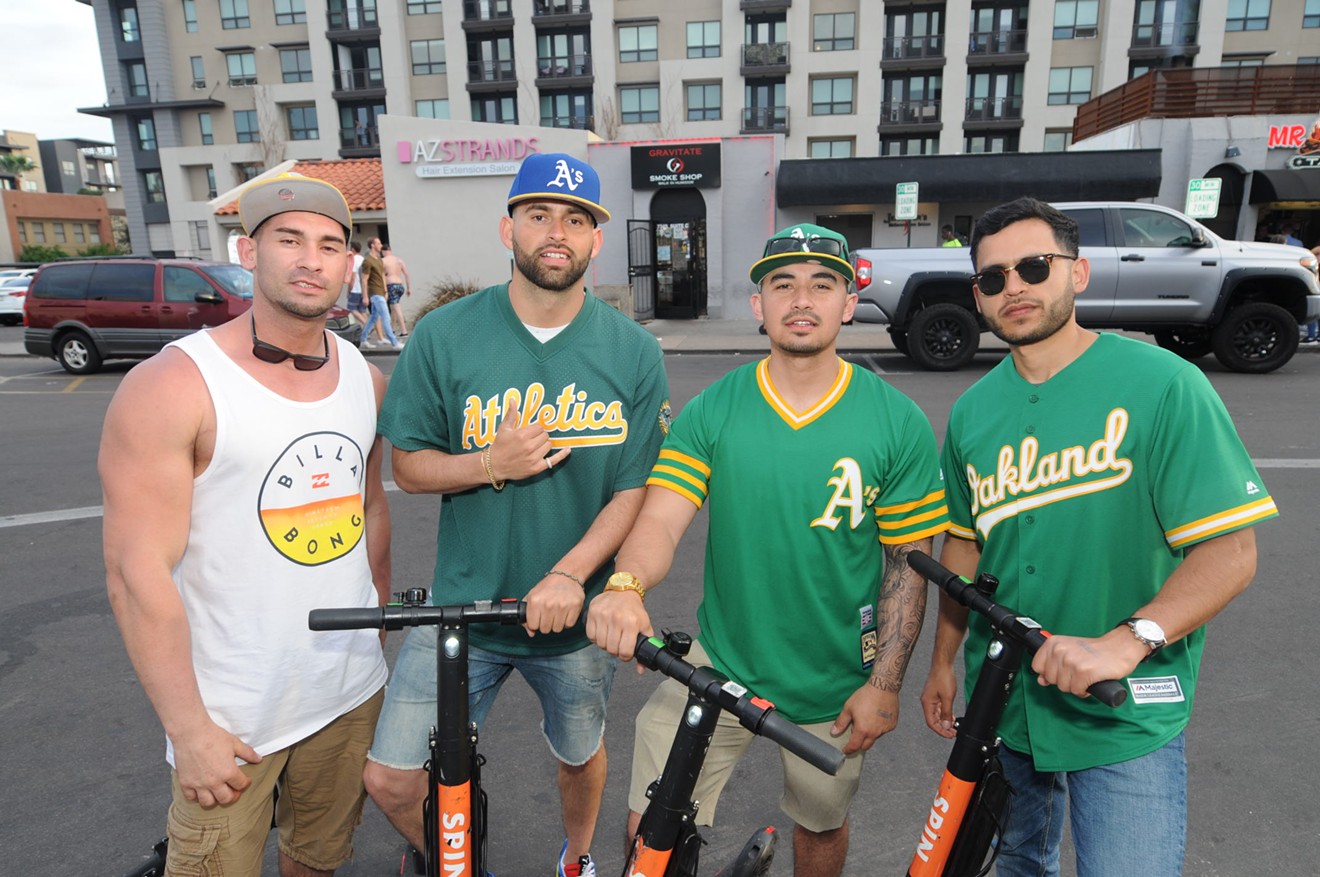 In better times, this group of Oakland A's fans used electric scooters to take them between bars in Scottsdale's Entertainment District.