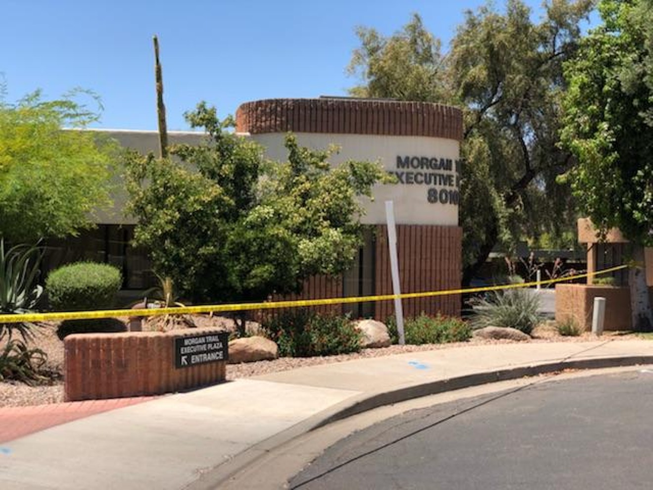 Police restricted access to an office near Mountain View Road in Scottsdale on Saturday.