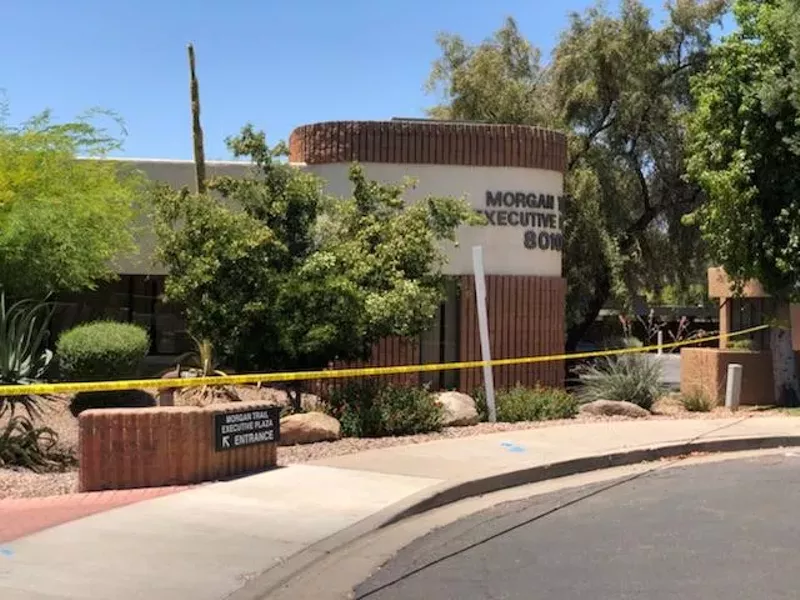 Image: Police restricted access to an office near Mountain View Road in Scottsdale on Saturday.