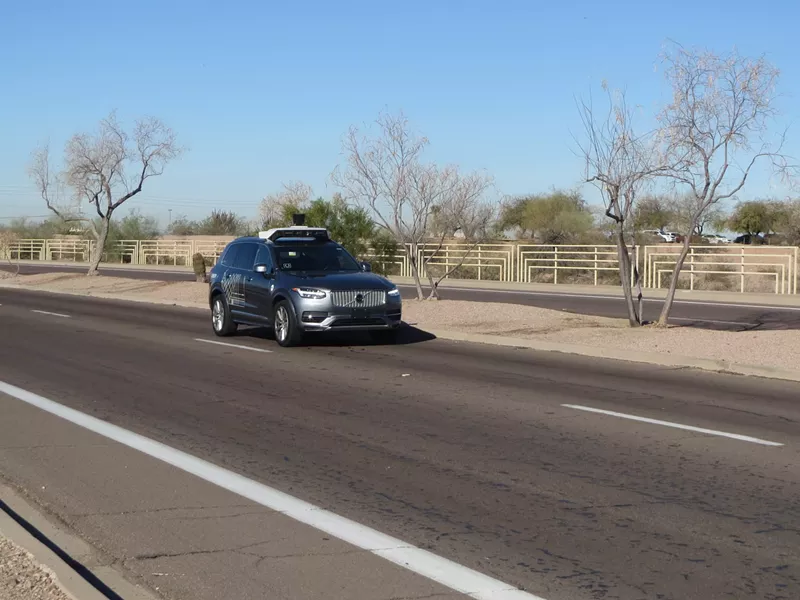 Image: Two federal agencies are now helping to investigate Sunday's fatal collision between a pedestrian and an Uber self-driving car.