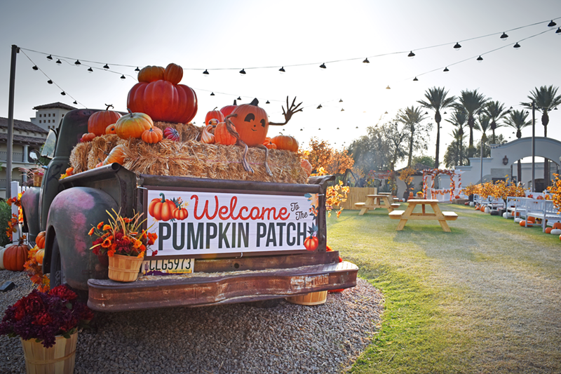 Pose with the pumpkin patch truck at the Fairmont Princess.