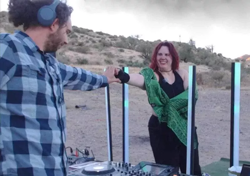 Image: John Bunyard (left) with girlfriend Ashtyn O'Hara at a desert rave on Sunday hours before they were shot.
