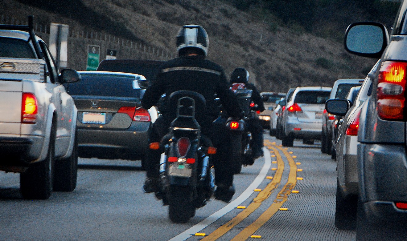 Motorcycle lane-splitting could become legal in Arizona under a proposed new law.