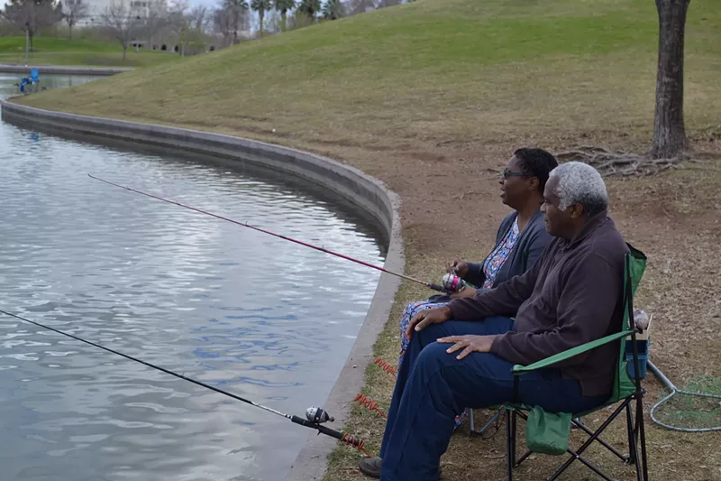 Image: Emily and Steven Rainge regularly eat their catch from the pond in Steele Indian School Park.
