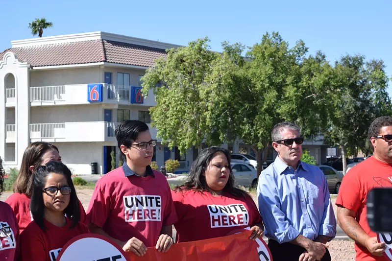 Image: Organizations and legislators gathered on Friday outside a Motel 6 location that regularly shared guest information with ICE.
