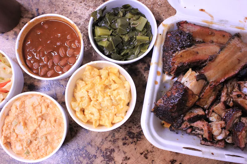 Image: A mixed meat platter and armada of sides from JL Smokehouse.