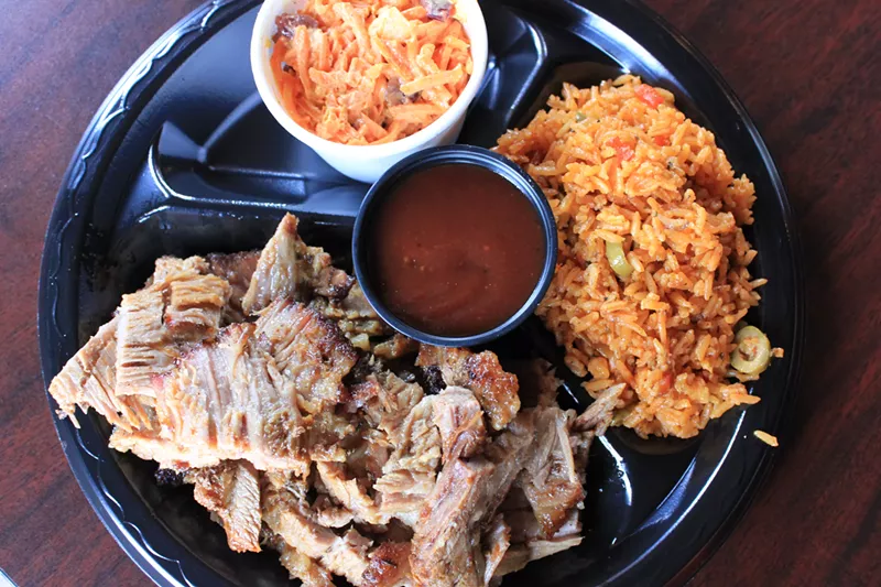 Image: Chopped brisket, Caribbean rice, and carrot salad.