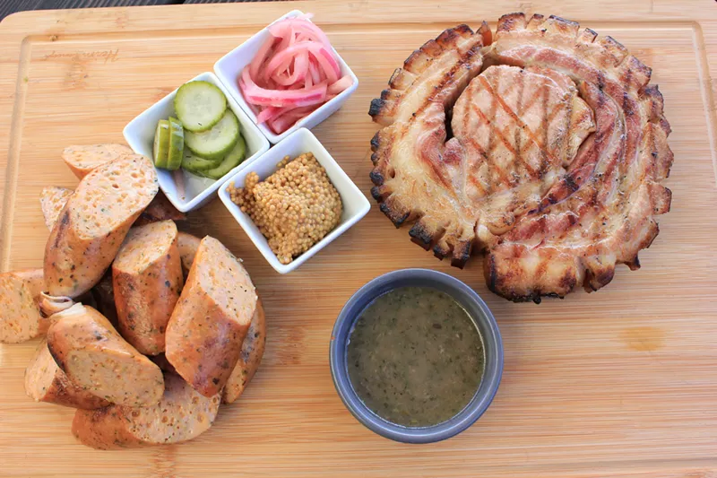 Image: A barbecue platter from Starlite features unusual condiments: various pickles.