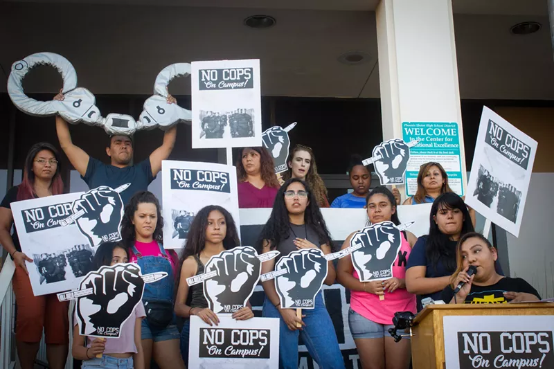 Image: Students gathered outside the Phoenix Union School District's headquarters to demand school resource officers be removed from campus.