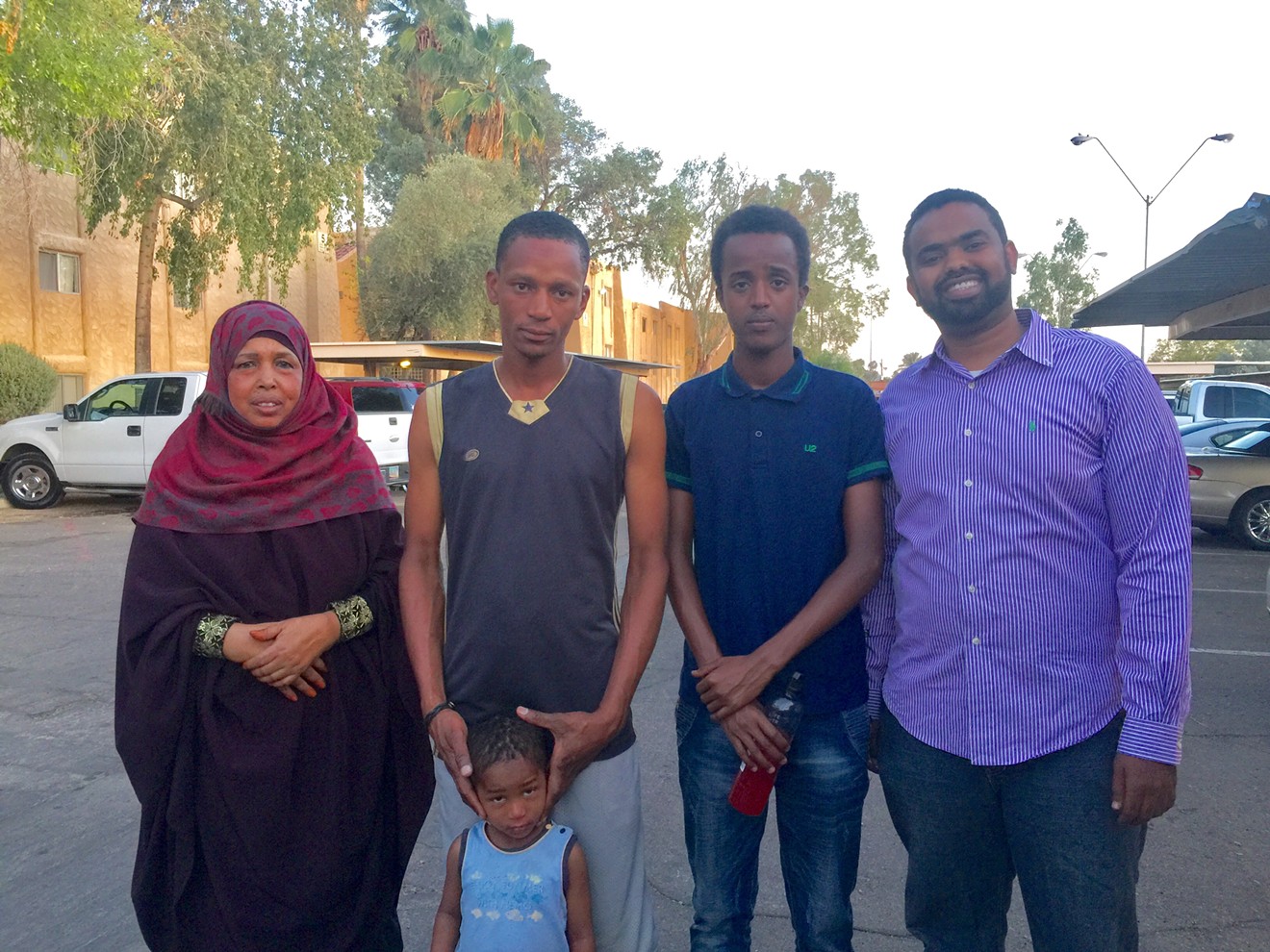 Mukhtar Sheik (right) with Bilad Yusuf (left) and family members.