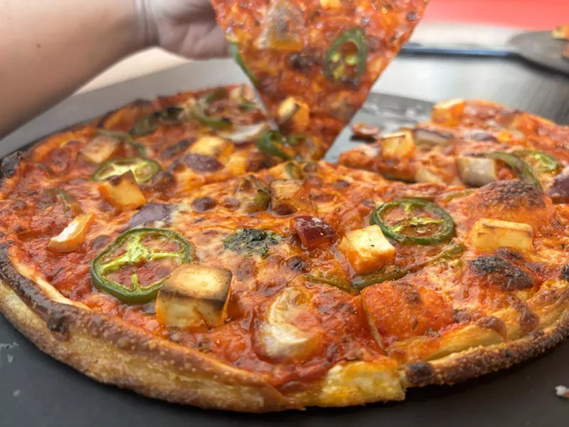 Image: The trend of Indian pizza is finally hitting the Valley, with two shops in Tempe serving spiced slices.