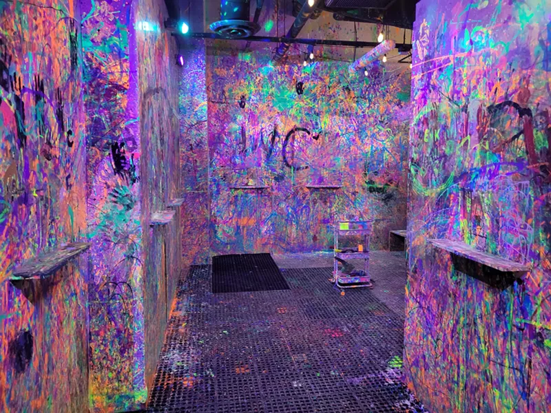 Image: A paint-splattered room.