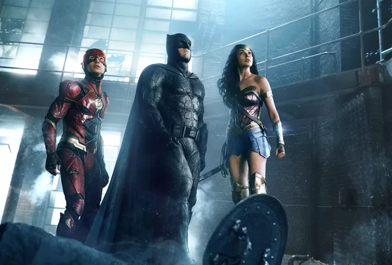 Image: Among the players on this winning team of superheroes in Justice League are (from left): The Flash (played by Ezra Miller), Batman (Ben Affleck) and Wonder Woman (Gal Gadot).