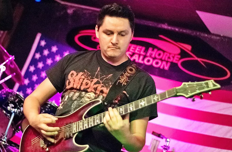 Image: Christopher Montano of rock band Absolute Threshold performs at Steel Horse Saloon in 2018.