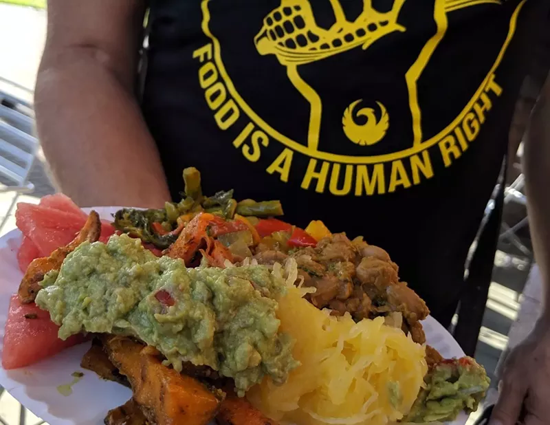 Image: Food Not Bombs is a group in Phoenix serving meals to the community using surplus food. Here's how that works.