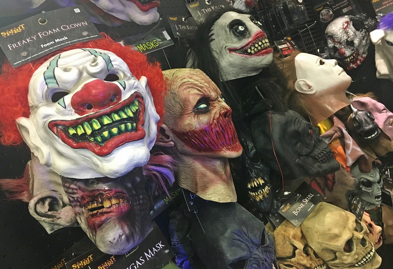 Masks and costume items for sale at a local Spirit Halloween store.
