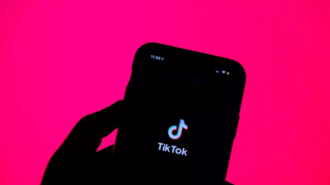 a tiktok logo on a phone