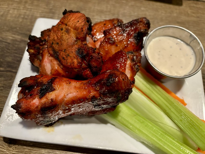 At Hamburguesas y Cervezas, chicken wings get the al pastor treatment.