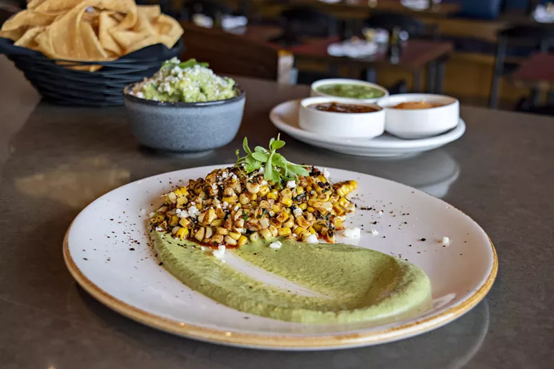 Image: Elote plus chips plus salsa plus guac equals happiness at Vecina.