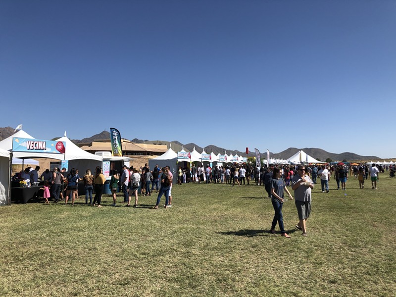 The McDowell Mountains rise behind the north tents of the Arizona Taco Festival