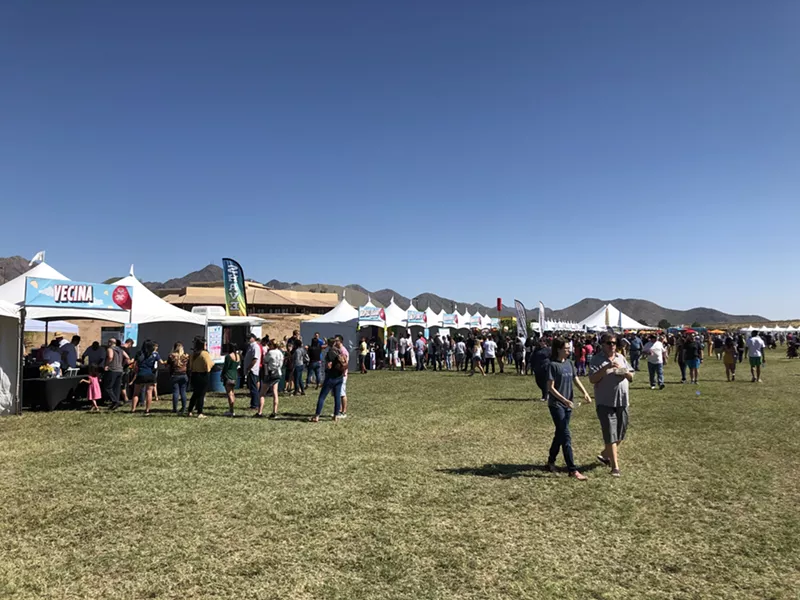 Image: The McDowell Mountains rise behind the north tents of the Arizona Taco Festival