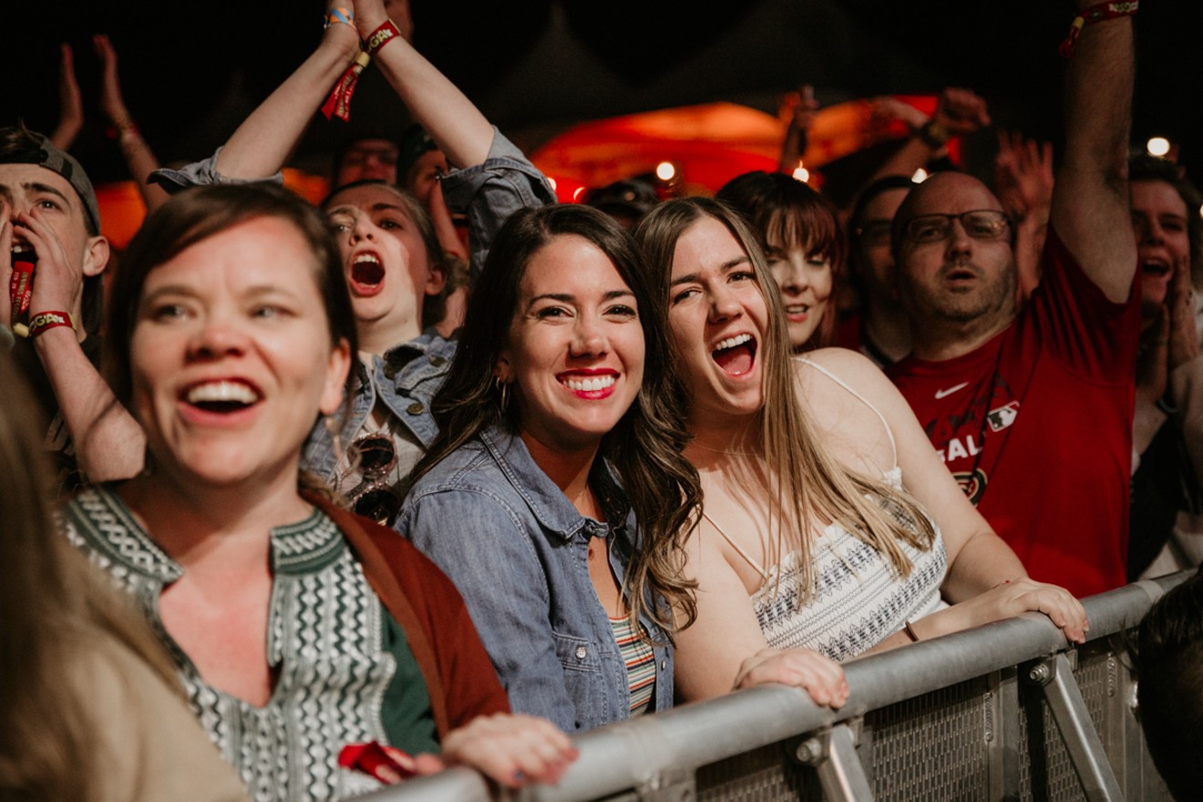 Fans cheer on Weezer as they take the stage Sunday night.